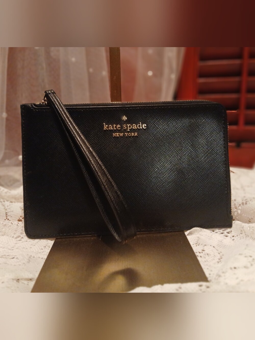 kate spade Black Leather Wristlet Clutch with Gold Logo